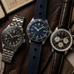 Montres Breitling homme Navitimer Chronomat Superocean sur table bois